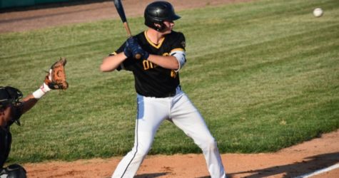 Clutch Hits Late Help Oilmen Edge Hounds in Pitchers’ Duel